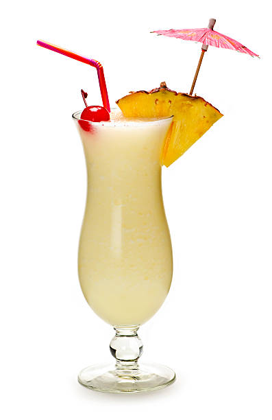 piña colada cóctel - drink umbrella cocktail glass isolated fotografías e imágenes de stock