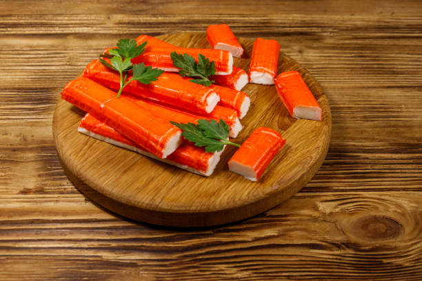 istock Crab sticks on cutting board on wooden table 1143338742