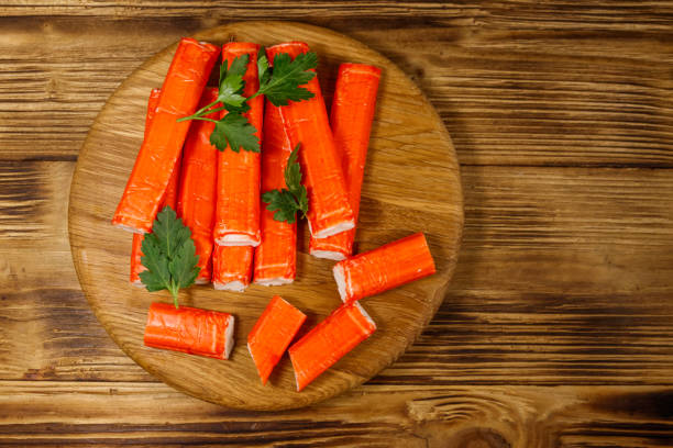 istock Crab sticks on cutting board on wooden table 1143338759