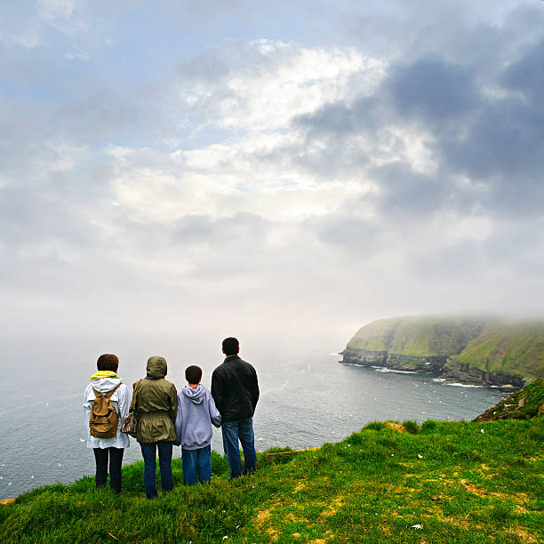 istock Family looking at ocean view in Newfoundland 114333975