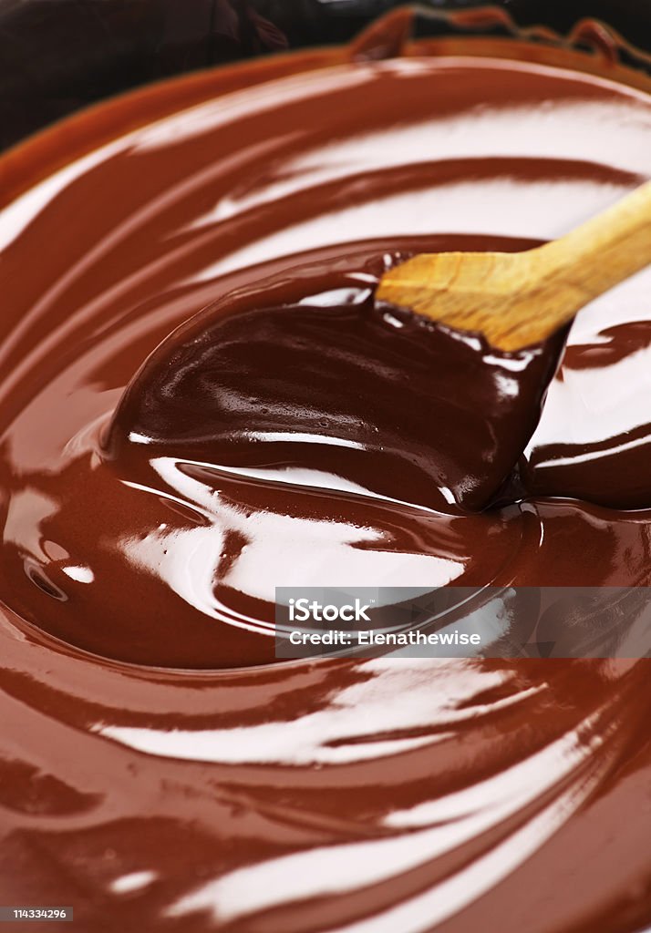 chocolate derretido e colher - Foto de stock de Açúcar royalty-free