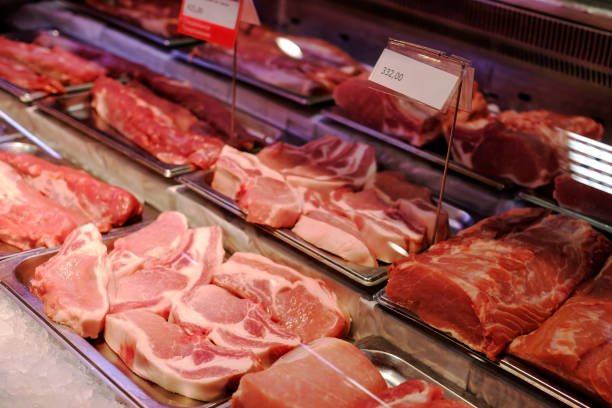 istock Sliced raw meat on a shelf in a supermarket. 1143343926