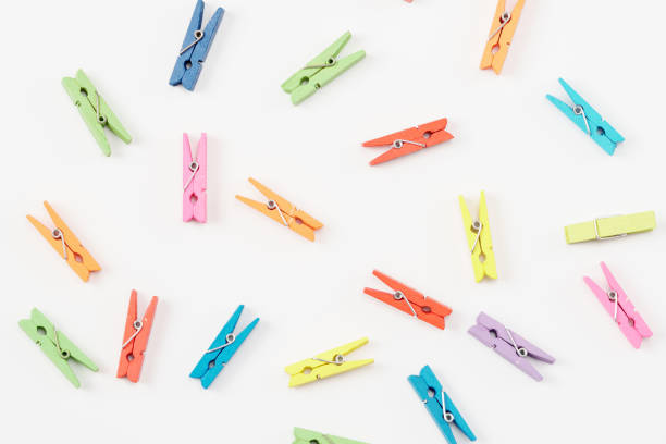 istock Colorful wooden clothespins on white background 1143343965