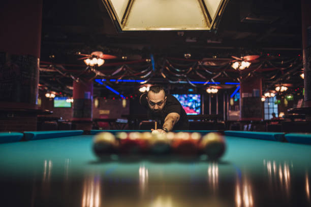 istock Bearded man playing snooker in a pub 1143347746