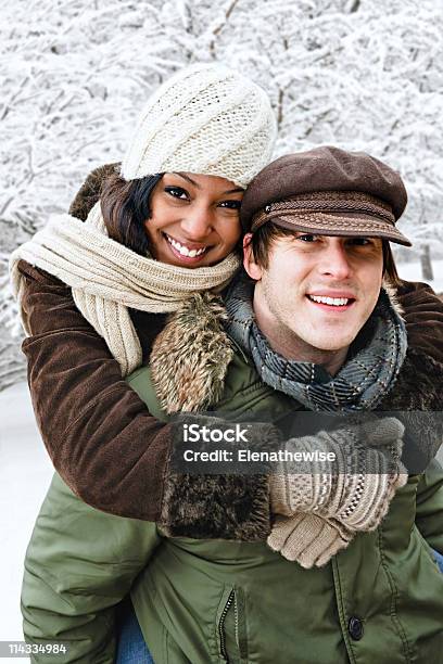 Couple Having Fun Outside In Winter Stock Photo - Download Image Now - Friendship, Playful, Playing