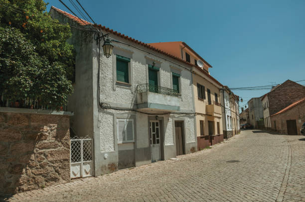 istock House with colorful plaster on deserted alley 1143353308