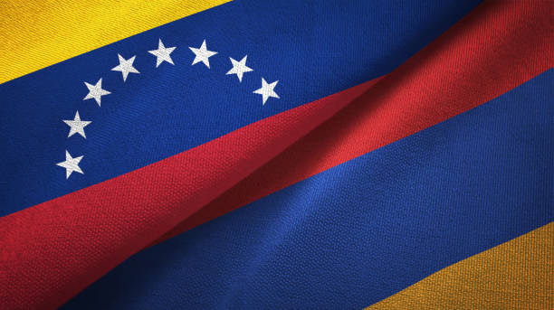 istock Venezuela and Armenia two flags textile cloth, fabric texture 1143353944