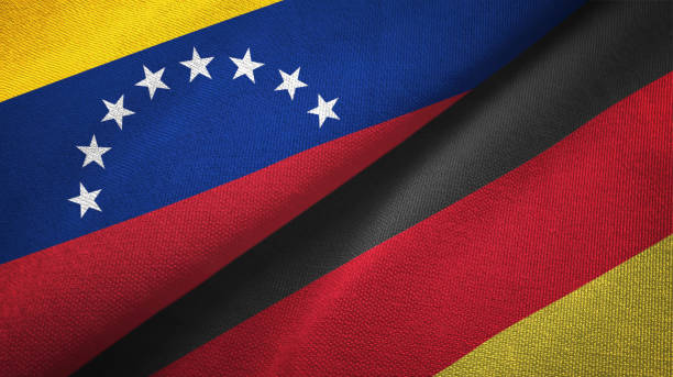 istock Venezuela and Germany two flags textile cloth, fabric texture 1143354033