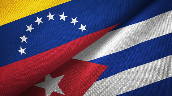 Venezuela and Cuba two folded flags together