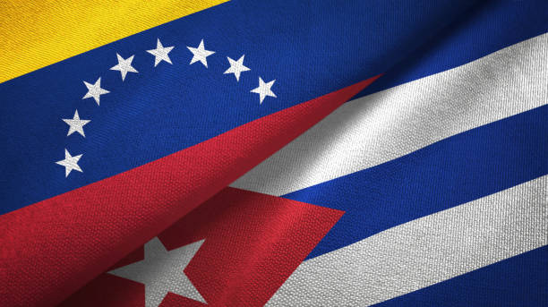 Venezuela and Cuba two flags textile cloth, fabric texture Venezuela and Cuba two folded flags together cuba market stock pictures, royalty-free photos & images