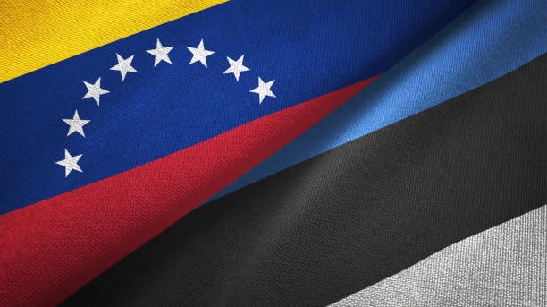 istock Venezuela and Estonia two flags textile cloth, fabric texture 1143354181