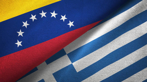 istock Venezuela and Greece two flags textile cloth, fabric texture 1143354235