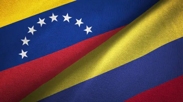 Venezuela and Colombia flags together relations textile cloth, fabric texture