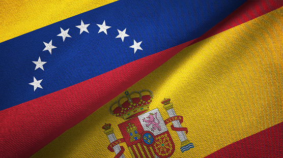 Venezuela and Spain flags together relations textile cloth, fabric texture