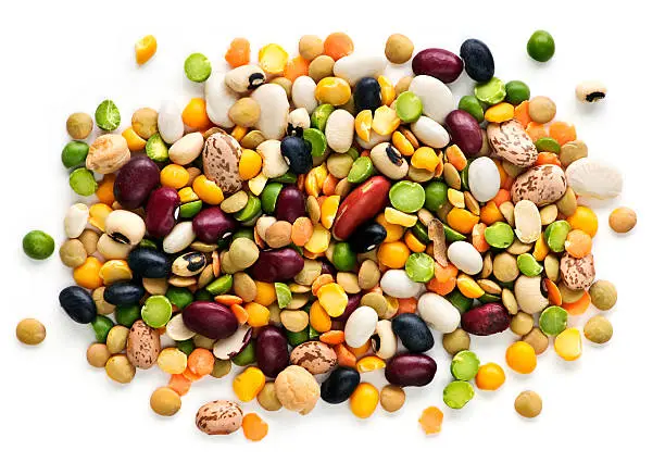 Mixture of dry beans and peas isolated on white background