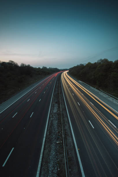 istock Headlights and Taillights on M1 Motorway at Night in UK 1143358398
