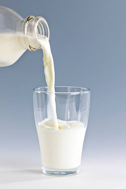 istock Pouring milk into glass 114336059