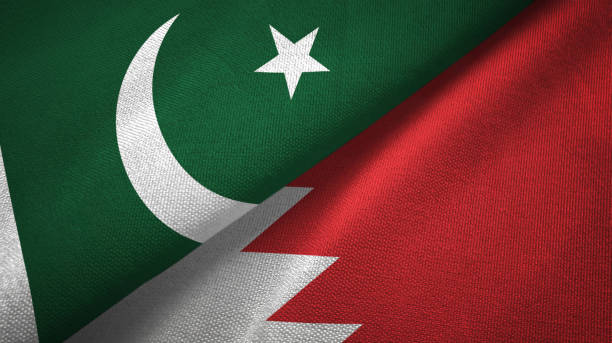 istock Pakistan and Bahrain two flags textile cloth, fabric texture 1143362098