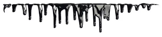 Photo of Black ink paint dripping isolated on white