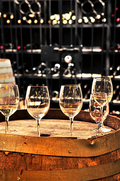 istock Wine  glasses and barrels 114336422
