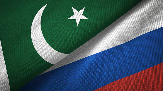 Pakistan and Russia flags together relations textile cloth, fabric texture