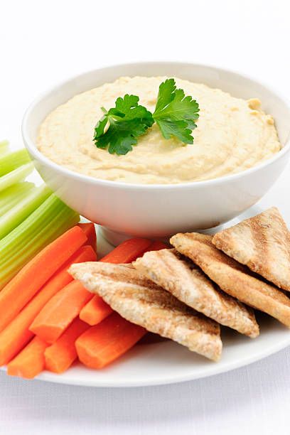 istock Hummus with pita bread and vegetables 114336489
