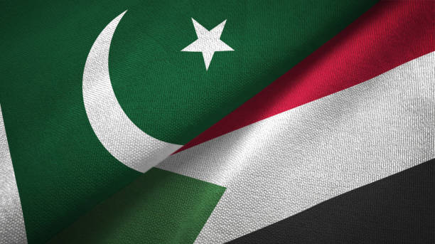 istock Pakistan and Sudan two flags textile cloth, fabric texture 1143365017