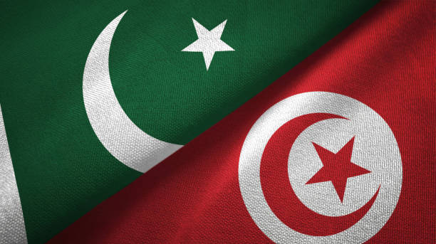 istock Pakistan and Tunisia two flags textile cloth, fabric texture 1143365027