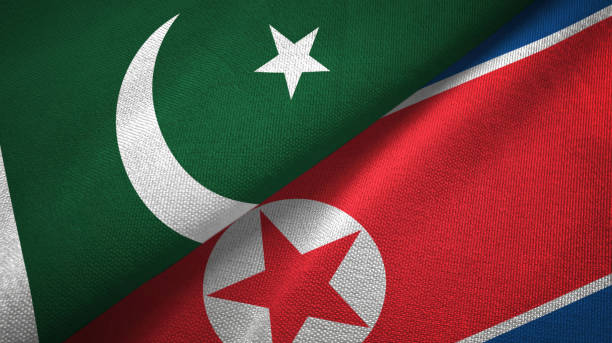 istock Pakistan and North Korea two flags textile cloth, fabric texture 1143365281