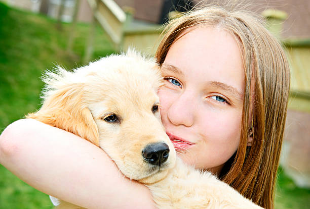istock Girl with puppy 114336736