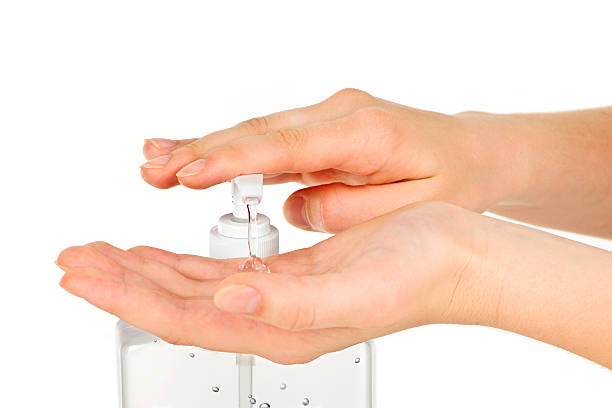 istock Hands with sanitizer gel 114337294