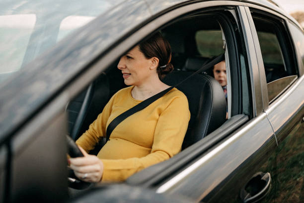 istock Mother driving her son to home 1143374637