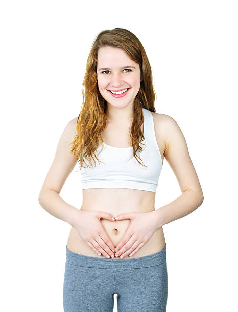 istock Smiling girl with hands on tummy 114338812