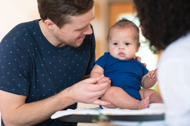 istock Doctor gives baby a checkup 1143390194