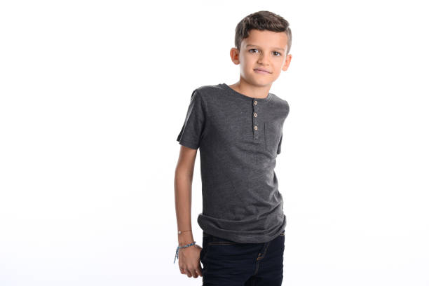 istock portrait of a young boy kid studio shot on white background 1143390214