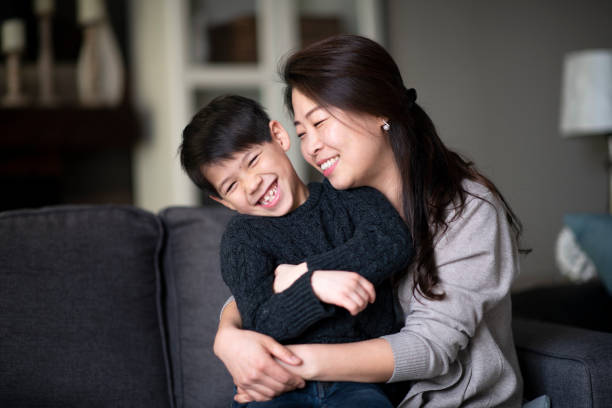 istock Mother and Son Snuggling 1143390355