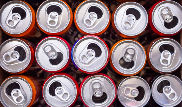 istock Empty aluminium drink cans recycling background concept, top view closeup 1143394194