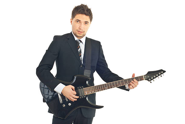 istock Young formal man with guitar 114340018