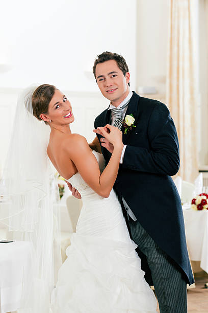 istock Bride and groom dancing the first dance 114340098