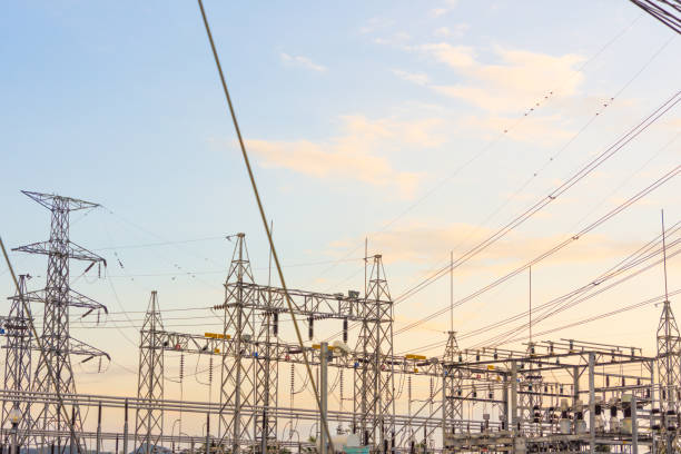 istock Electricity concept. Close up high voltage power lines station. 1143405423