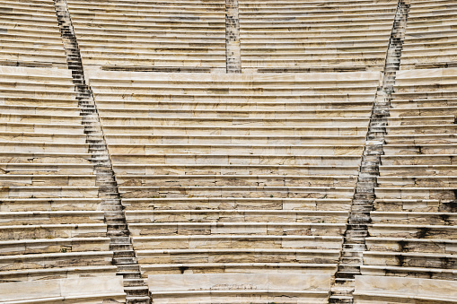Stairs background in theater Herod Atticus in Athens Acropolis, Greece