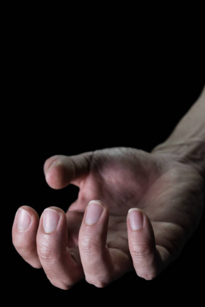 istock Upturned Human Hand for Devil Crime Violence Concept in Book Cover Style 1143409102