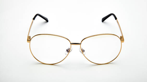 istock Golden border glasses on white background 1143414720