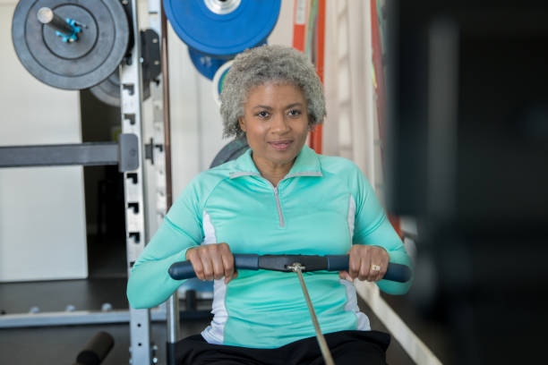 istock Senior woman working out at a modern gym 1143418595