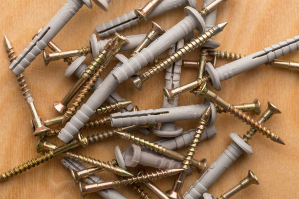 istock Dowel for fixing building materials on wooden  background 1143418718