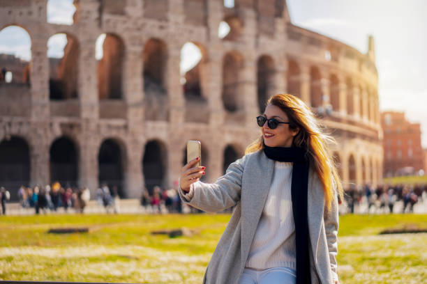 istock Blonde girl taking selfie in Rome 1143419930