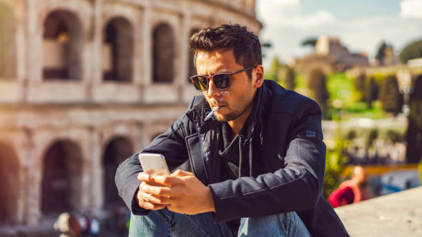 istock Man talking by phone in Rome 1143420724