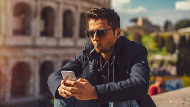 istock Man talking by phone in Rome 1143420816