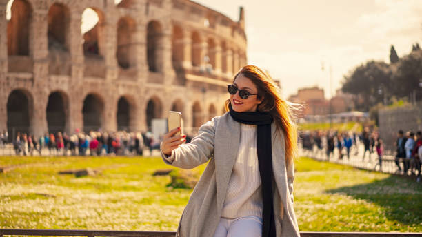 istock Blonde girl taking selfie in Rome 1143420896
