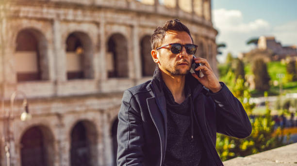 istock Man talking by phone in Rome 1143420950
